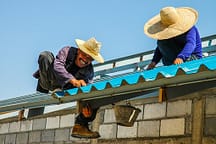 men on roof