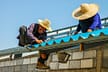 men on roof